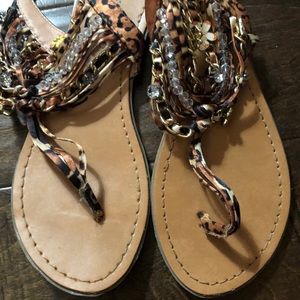 Leopard sandals with cute decoration on them